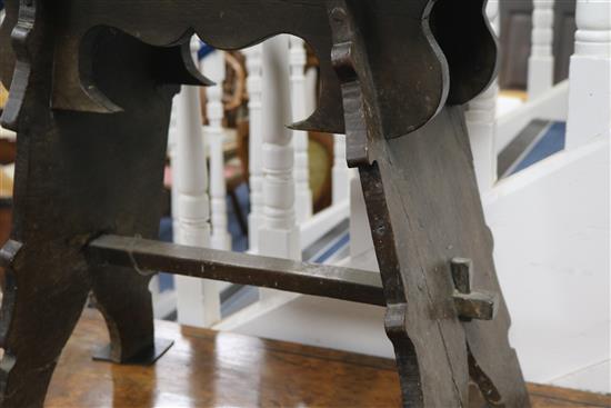 A Tudor style boarded oak stool, H.54cm